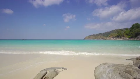 Beach sea sand sun cloud water wave blue sky background Freedom Phuket Thailand Stock Footage 153376339