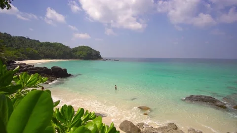 Beach sea sand sun cloud water wave blue sky background Freedom Phuket Thailand Stock Footage 153376488