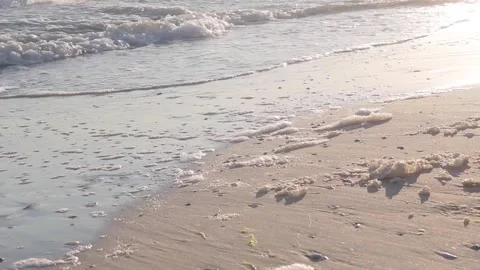 Beach sea sand with waves at the sunset Stock Footage 177051321