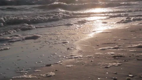 Beach sea sand with waves at the sunset Stock Footage 177051328