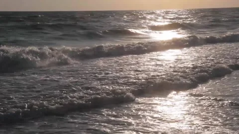 Beach sea sand with waves at the sunset Stock Footage 177051572