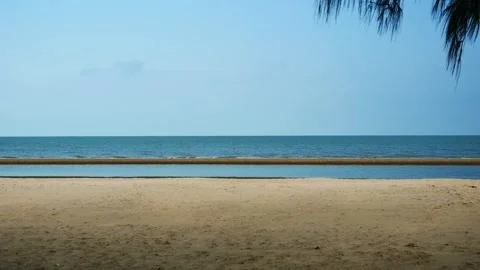 Beach with sea smooth and white cloud on beautiful blue sky Video stock 333663103