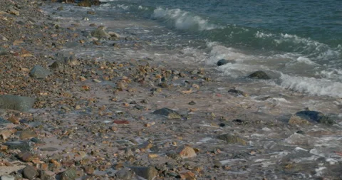 Beach with sea wave with rock stone Stock Footage 144907751