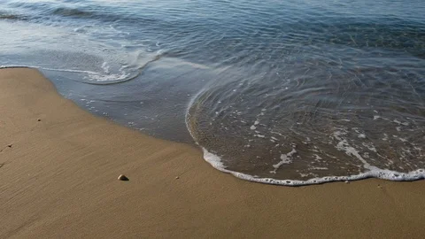 Beach with sea waves with calm sky Stock Footage 124534589