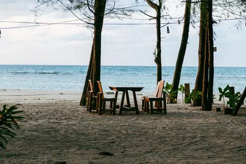 Beach seating under trees at Nai Yang Beach Phuket Thailand Stock Photos