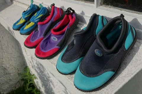Beach shoes Stock Photos