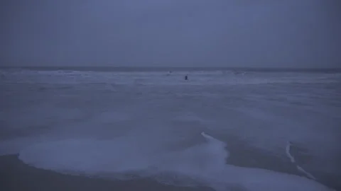 Beach shore in the Atlantic Ocean at a cloudy sunset. Domburg, the Netherlands. Stock Footage 270567045