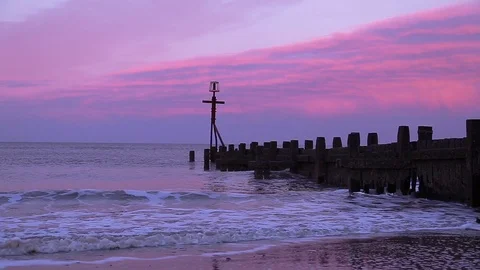 Beach shoreline at sunset Stock Footage 98678061