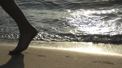 Beach shoreline at sunset with small slow motion waves 스톡 동영상 293931932