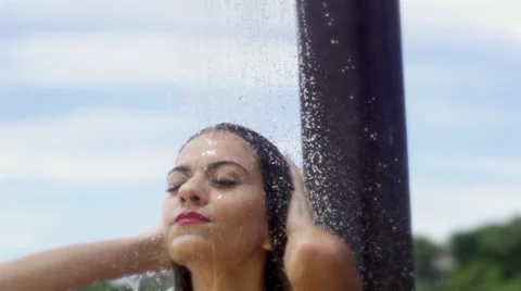 Beach shower with bikini model- Rio De Janeiro beach 動画素材 33649947