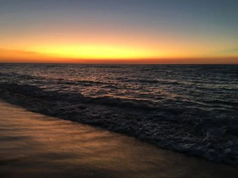 Beach side under the sunset Stock Photos