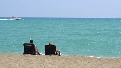 Beach-Side View With Lounge Chairs Vidéo 96588711
