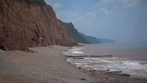 The beach at Sidmouth in Devon.  the wild end of the town beach Video stock 156188374