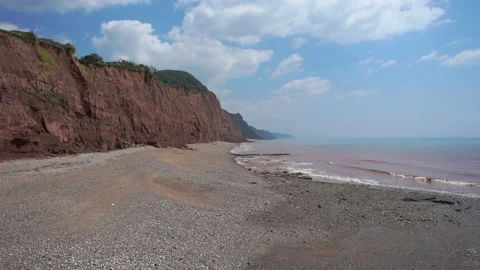 The beach at Sidmouth in Devon.  the wild end of the town beach Video stock 156188876