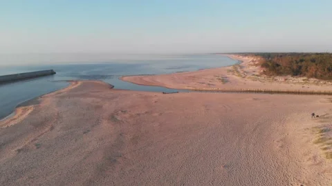 Beach from the sky filmed by a drone, Baltic Sea aerial footage Stock Footage