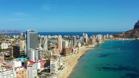 Beach in Spain with the skyline of calp in the background Video stock 146878559