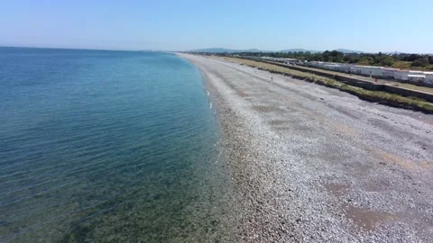 Beach Spanning to Horizon UK 4K Stock Footage 205919528