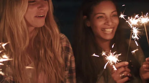 Beach sparkler fun Stock Footage 64564078