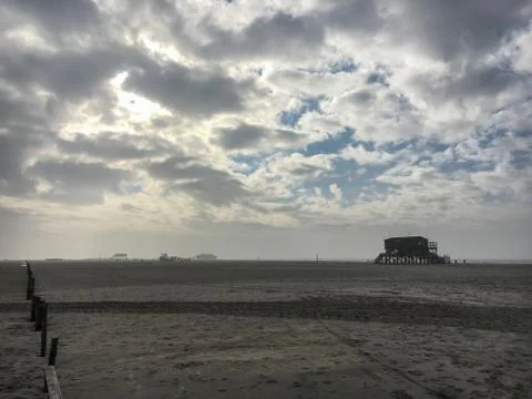 Beach in St. Peter-Ording on a cloudy day in winter Stock-Fotos
