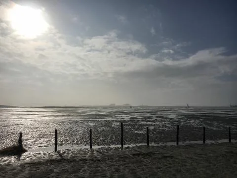 Beach in St. Peter-Ording on a cloudy day in winter Stock Photos