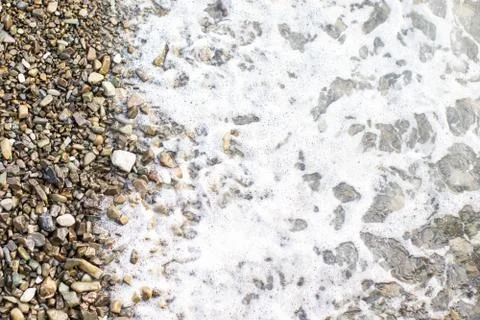 Beach stone background with sea Stock Photos