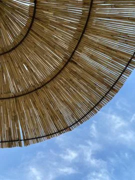 Beach straw umbrella background 3 Stock Photos