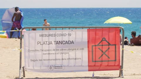 Beach in Summer. Beach Closed due to Excess Capacity. New Covid 19 Reality Video stock 135778979