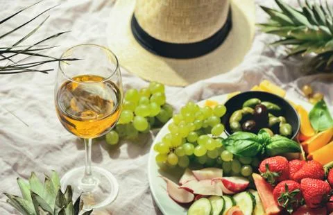 Beach summer table setting with fruits and veggies Stock Photos