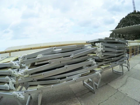 Beach sunbeds stacked Stock Footage 71762004