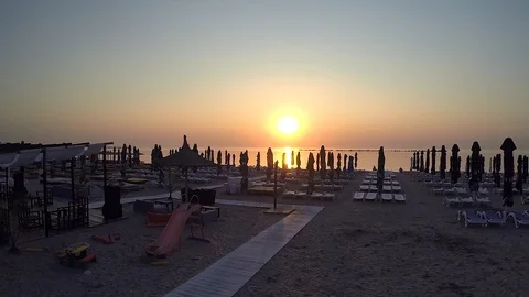 The beach at sunrise Video stock 101178519