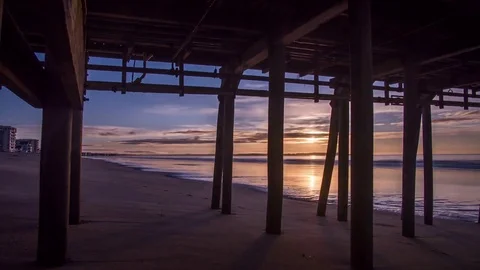 Beach Sunrise Motion Timelapse Under the Pier, Old Orchard Beach, Maine Video stock 78453555