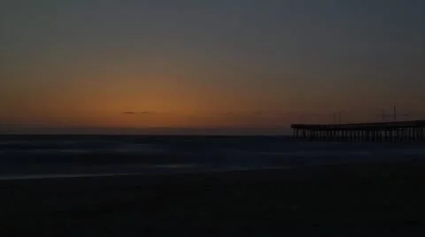 Beach Sunrise (with pier).mp4 Stock Footage 10954367
