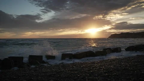 Beach at sunset 4K 10 Stock Footage 238430785