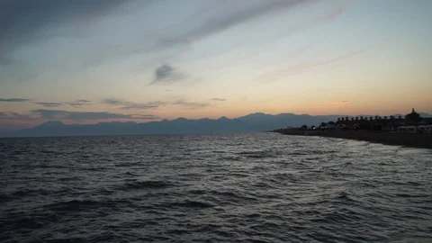 The beach at sunset with amazing wave Stock-Footage 128927378