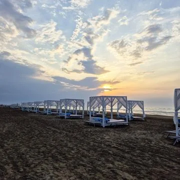 Beach sunset and sky Stock Photos