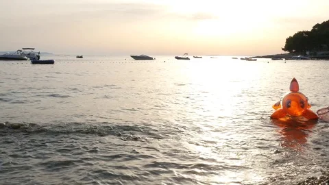 Beach on sunset with boats Stock Footage 78909872