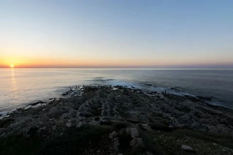 Beach sunset on a calm summer day Stockbeeldmateriaal 164380882