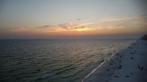 Beach Sunset With Clouds Stock Photos