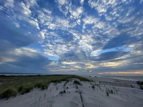 Beach at Sunset with Dramatic Sky Foto stock