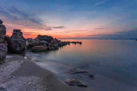 Beach at sunset landscape Stock Photos
