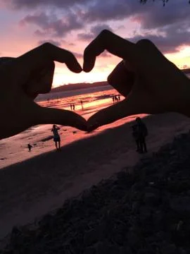 Beach sunset with love Stock Photos
