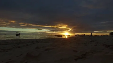 Beach Sunset in Mauritius with People walking into the Night Stock Footage 78813469