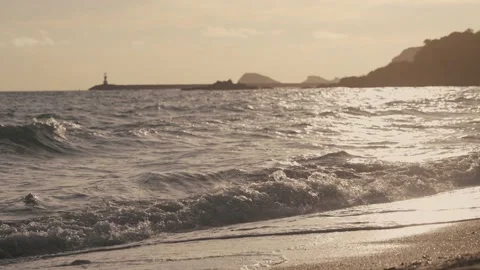 The beach on sunset with mountain background. Stock Footage 202257418