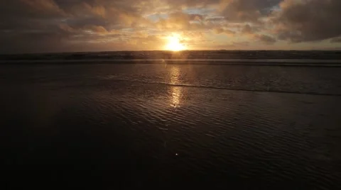 Beach at Sunset with Orange/Red Sky (Blackpool, UK)  Stock Footage 56854210
