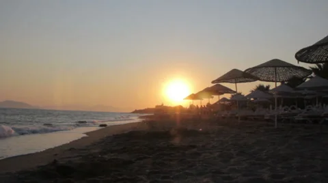 Beach At Sunset With People Walking Stock Footage 36764980