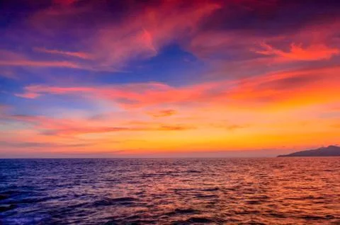 The beach at sunset Stock Photos