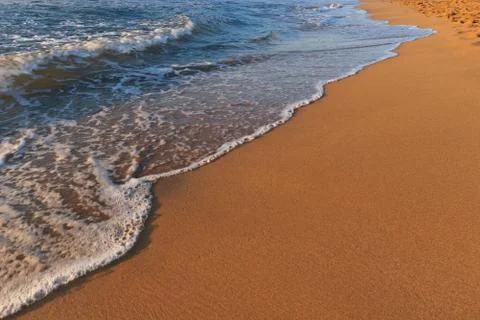 Beach at sunset Stock Photos