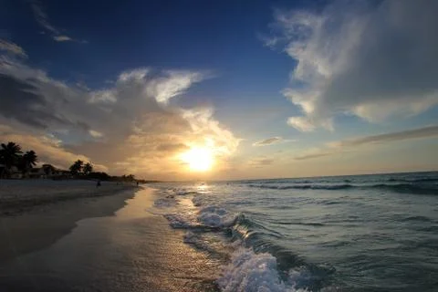 Beach at sunset Stock Photos
