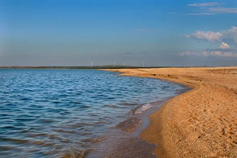 Beach at sunset Stock Photos