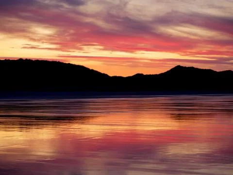 The beach at sunset Stock Photos